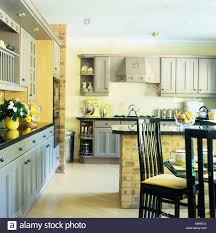 tall back black chairs at table in