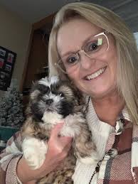 Dobie puppy growing fast and loves people