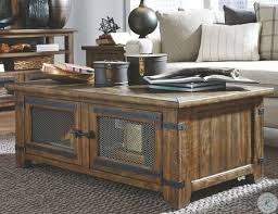 This distinctive piece serves a dual purpose by becoming a raised table/desk surface at the lift of a finger. Isabella Farmhouse Timber Lift Top Storage Cocktail Table From Magnussen Home Coleman Furniture
