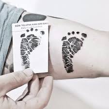 Are there any good tattoos for moms and dads? Baby Footprint Tattoos Popsugar Family