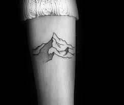 Top 47 Minimalist Mountain Tattoo Ideas 2021 Inspiration Guide Mountain Tattoo Minimalist Mountain Tattoo Male Tattoos Ideas
