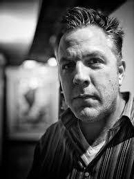 ABOUT — TRACY G. JONES