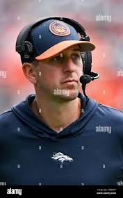 Denver Broncos offensive quality control Logan Kilgore looks