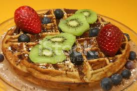 I used canola oil instead of butter and added flax seed, cinnamon, a touch of nutmeg, and cut the sugar back by 1/2 tbsp. Wafles Con Fruta Fotografias De Stock Freeimages Com