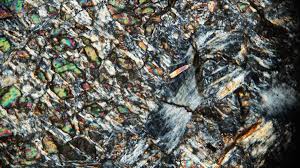 Serpentine Replacing Olivine From A Magnesite Bearing Sample Taken Near Llano Tx Limestone Bands Occur Within The Packsaddle Olivine Fabric Textures Schist