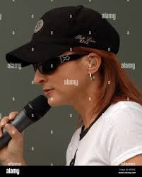 Singer Gloria Estefan rehearses for A Capitol Fourth 2005 as Catherine  Elizabeth Colbert, 15 months old, dances