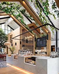 I Generally Don T Like Modern Designs But I Love The Botanical Organic Feel Of This Space There Modern Tree House Cafe Interior Design Coffee Shops Interior