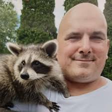 What is the best and safest heat source for chickens and ducks in Wisconsin?