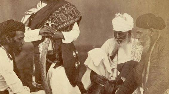 Rajput men playing the game of Pachisi