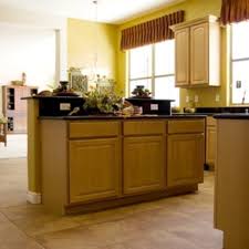 How To Clean Sticky Kitchen Cabinet Doors With Images Clean Kitchen Cabinets Laminate Cabinets Corian Countertops