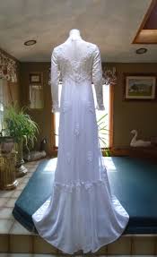 Now, empire waists are a popular silhouette most often used for wedding dresses but still common in everyday dresses. Vintage 1970 S Victorian High Illusion Neck Regency Empire Style Long Sleeve Wedding Dress Theredvelvetshoe Com Shop Luxury Designer Vintage Clothing