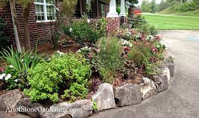 However, this stone edging needs a good liner to help hold it in place. Using Stone For Landscape Borders And Edging Art Of Stone Gardening