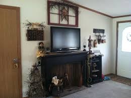 Affordable variety of country primitive home decor, including battery candles, pip berries, light strands, crossroads scented candles and more. Primitive Fireplace Faux Fireplace Primitive Decorating