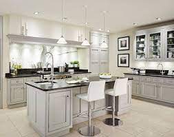 You can also achieve a contemporary color scheme by choosing contrasting paint colors. Light Grey Kitchen Cabinets With Black Countertops Novocom Top