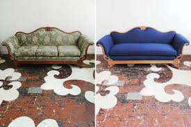 Tearing the original fabric off the frame of a sofa or chair and replacing it with new fabric is called reupholstering. Reupholstered Victorian Sofa Victorian Sofa Sofa Makeover Sofa Wood Frame