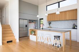 Small southwest galley brick floor and wood ceiling kitchen photo in phoenix with an undermount sink, shaker cabinets, dark wood cabinets, quartz countertops, multicolored backsplash, cement tile backsplash, stainless steel appliances, an island and beige countertops Warming Natural Modern Kitchen Contemporary Kitchen Auckland By Forte Timber Flooring Houzz