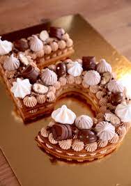 Cut the fairy fingers in the strips of meringues (sticks about 1cm). Number Cake Chocolat Tanariva Kinder En 2021 Decoration Gateau Chocolat Gateaux Et Desserts Gateaux Aux Numeros