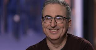 John Oliver delights in revealing the absurdity in the obscure in the U.S.,  his adopted homeland