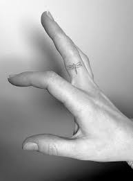 Finger Tattoos Tattoo Insider Tiny Finger Tattoos Dragonfly Tattoo Dragonfly Tattoo Designs