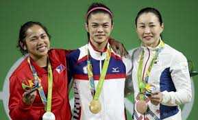 Philippines' hidilyn diaz reacts after winning the gold medal in the women's 55kg weightlifting competition at the tokyo olympics. Philippines Gets First Olympic Medal In 20 Years Arab News