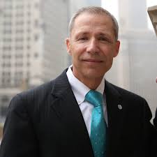 With trial imminent, ex-AT&T boss seeks to bar Madigan-related evidence