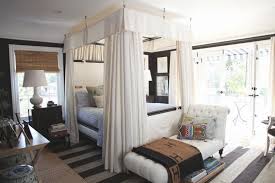 Area rug beside the bed is suitable for single bedroom. Rug Over Carpets