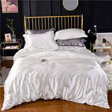 Delicate pink roses adorn the pure white comforter and pillows. Amazon Com White Ivory Luxury Silk Bedding Set Include Silk Duvet Cover Silk Pillow Sham And Silk Fitted Sheet Satin Silk Silk Blend Fabric No Comforter Or Duvet Insert Included King Size Home