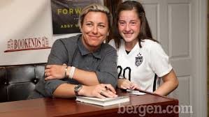Fans greet Olympic gold medalist Abby Wambach in Ridgewood