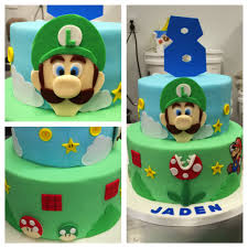 One of my earliest cakes but i put a lot of time into it as it was for my 5 year old's birthday, bless! Luigi And Mario Cake Luigi Cake Mario Cake Birthday Themes For Boys