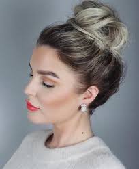 Sleek hair secured in a very low chignon is one of the trendiest professional hairstyles for work nowadays. 20 Cute And Easy Hairstyles For Work