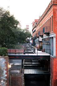 The Ultimate Guide To River Street In Savannah Ga Sand Sun Messy Buns Savannah Chat Savannah Ga River Street Savannah Ga