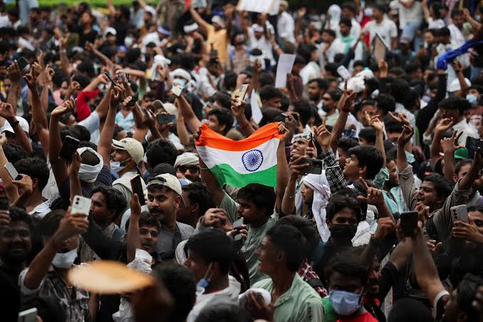 Explainer: What started India's 'cockroach' protests that forced education  minister to quit? | Reuters