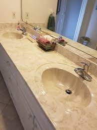 We had cultured marble sinks before our redo and i had alot of crazing in my sink and i was told that that i did the master bath reno in '03. Marlin Marble Cultured Marble Marlin Marble