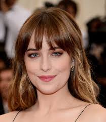 Dakota johnson reveals thongs were superglued to her body while filming fifty shades freed. Dakota Johnson Long Wavy Cut With Bangs Hair Lookbook Stylebistro