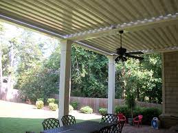 Our Louvered Roof System Provides You With Sun Shade And Protection From The Rain Visit Our Showroom Or Give Us A Pergola Louvered Pergola Covered Patio
