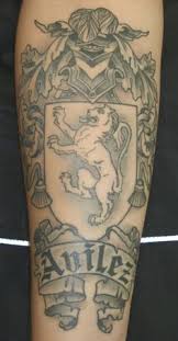 A family crest comes overflowing with choice details and a symbolic vibe. 38 Family Crest Tattoos Ideas Crest Tattoo Family Crest Tattoo Family Crest