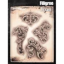 A popular filigree design is a locket and its key. Tattoo Pro Series 5 Stencils Filigree Flair Facepaint Com