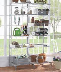 My husband donnie's office started out clut. Platinum Elfa Freestanding Sunroom Shelving The Container Store