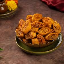 Khaja — layered fried pastry with syrup