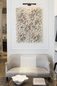 The wall decor features gold or silver metal with acrylic beads at the end. The Ceramic Floral Wall Hanging Was Actually Commissioned By Club Monaco To Help Define This Dre Contemporary Decor Contemporary Home Decor Creative Home Decor