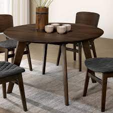 The tapered and angled legs form a pedestal base we hope you use the heck out of our tables and we know there will be many spills. Carson Carrington Breisgau Mid Century Round Dining Table Overstock 23570101