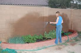 Building a retaining wall can open up quite a lot of room for your future garden! Retaining Wall Raised Garden Bed Wood Stone Landscape Design