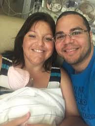 Noblesville couple welcomes naturally conceived quadruplets.