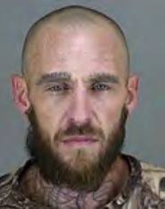 Man accused of tying up Lakemore woman, robbing her at gunpoint