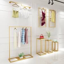 To make it easier to order and assemble commercial clothing racks, we offer a number of kitted clothing racks. 2021 Golden Iron Clothing Rack Modern Simple Floor Hanger Clothing Store Clothing Rack Wall Hanger Womens Vintage Floor Type Clothes Rack From Meow Householdes 214 33 Dhgate Com