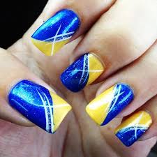 We've just made your life just that much so when colors like white, light brown and blue are combined to create this beautiful beachy nail art in dipped in yellow nail polish, create polka dots on all the nails while excluding the yellow painted nail. Pin By Donyale Gladue On Nail Art Designs Blue Nail Art Designs Blue Nail Art Yellow Nail Art