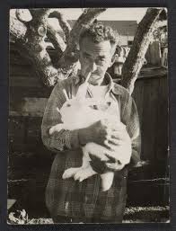 Man Holding A Rabbit From The Honore Sharrer Papers Image Gallery Animal Photo Old Pictures Historical Figures