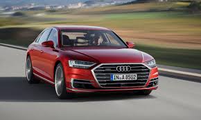 Dressed up in moonlight blue metallic paint with saiga beige leather and natural ash grain wood inlays. 2019 Audi A8 First Look Autonxt