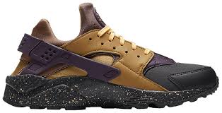Leather upper with classic woven huarache detail. Air Huarache Premium Elemental Gold Nike 704830 012 Goat
