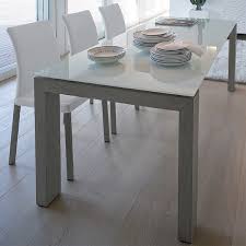 The marble look glass top is elegant while the base is architectural and abstract. Antonello Italia Montreal Glass Dining Table Contemporary Dining Room Furniture Ultra Modern